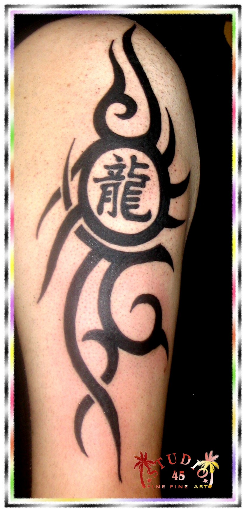 OberarmTribal - Zeichen Drachen Tattoo Recklinghausen STUDIO 45